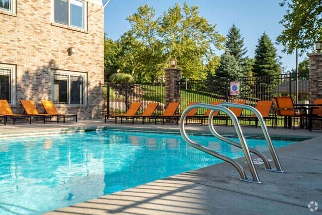 Relax and unwind by the swimming pool on sunny afternoons. - Grand Legacy Rental