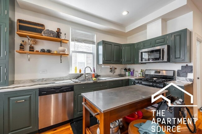Building Photo - 2833 N Spaulding Ave Unit 1F