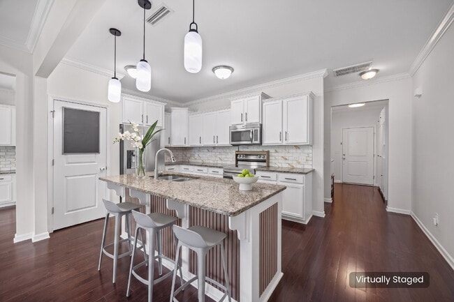 Photo - "Spacious 3-Bedroom Townhome with Fireplace, Pergola & Community Pool on Summerlake Drive!"
