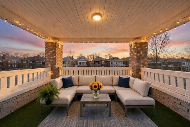 Covered Balcony. Image is virtually staged