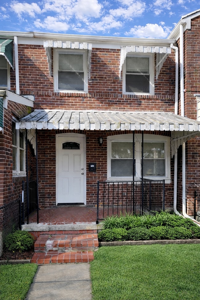 Photo - Charming Updated 2BR Rowhome with Modern Kitchen & Washer/Dryer