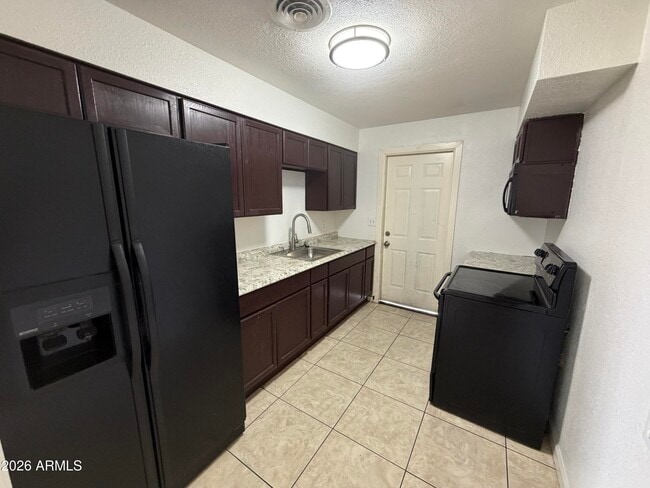 Building Photo - 625 E Broadway Rd