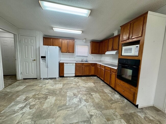 Photo - Spacious 4/2 Doublewide Mobile Home in a Peaceful Setting Unit JACOBS-1211 Dwellings