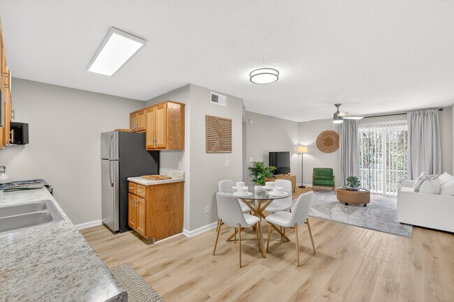 Modern kitchen with stainless steel appliances - Saddlebrook Apartments