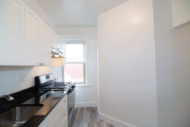 Photo - Renovated 2BR apartment with balcony, heat inc. on Brookilne/Allston line!