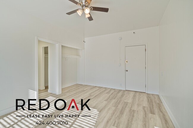 Photo - Welcoming Studio with Large Windows, Hardw... Unit 311