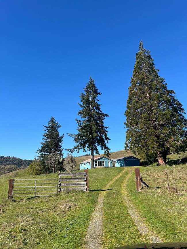 Building Photo - Peaceful Country Home with Patio & Detached Garage