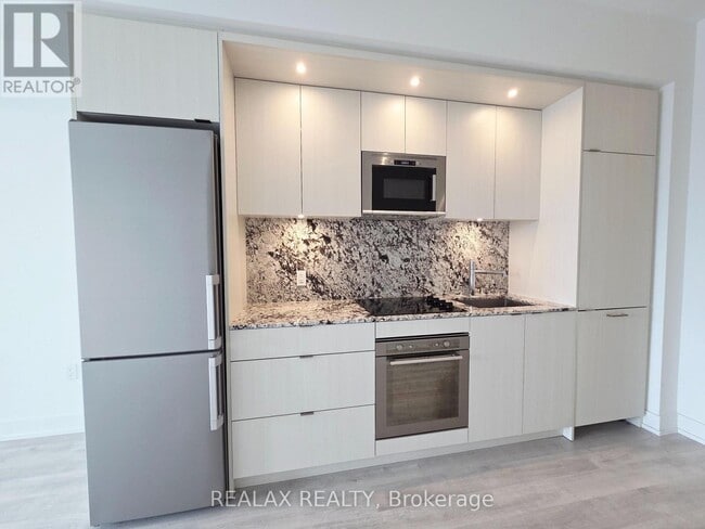 Photo - 30 Inn On The Pk Dr Unité 1107