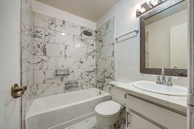 Photo - Charming Single-Level Townhome with Modern Flooring & Update Bathroom & Kitchen