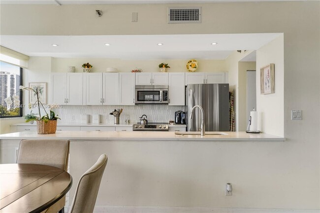 Building Photo - 20185 E Country Club Dr Unit 405