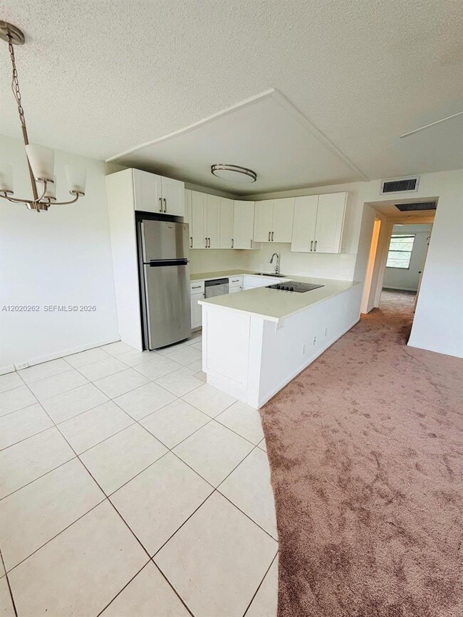 Building Photo - 335 Brighton H Unit 335