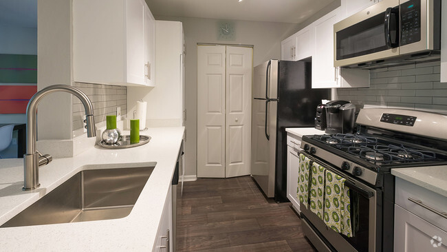 Redesigned kitchens with granite counters, stainless steel appliances and subway tile - Alister Quincy Rental