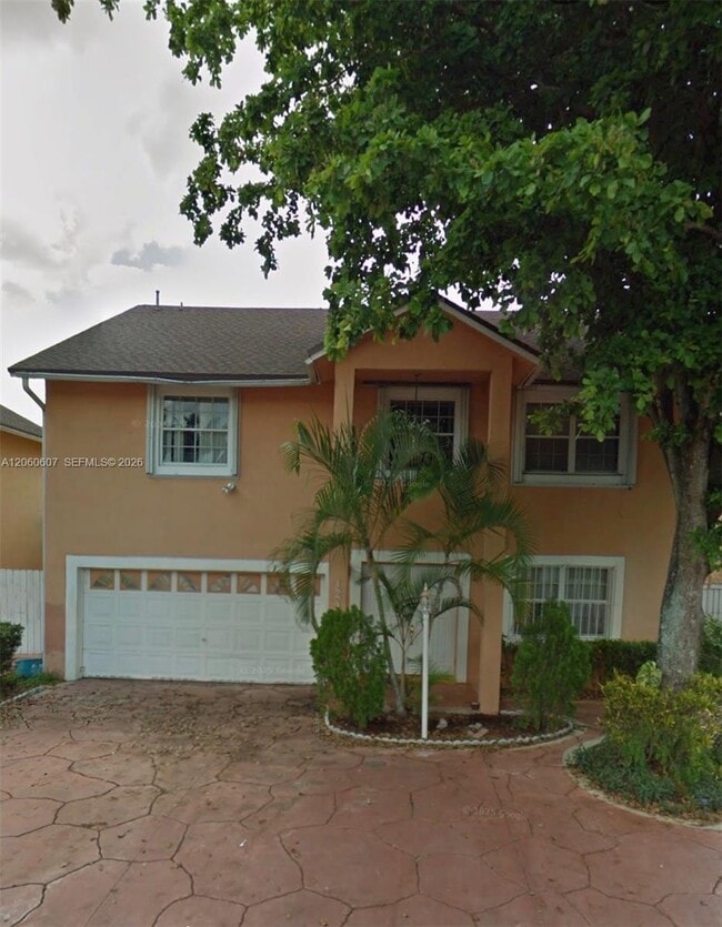 Building Photo - 18849 NW 78th Pl Unit A