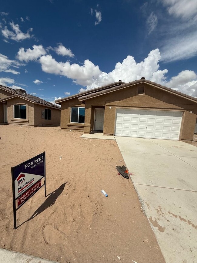 Building Photo - BRAND NEW 4 Bedroom in Desert Sands! Rental