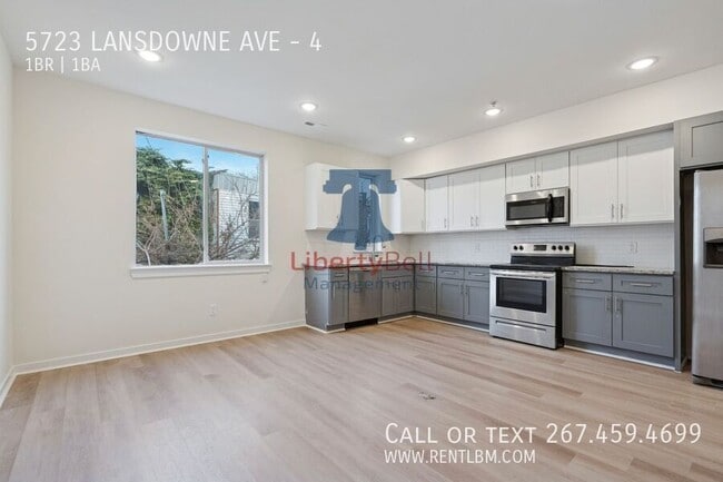 Building Photo - 5723 Lansdowne Ave Unit 4