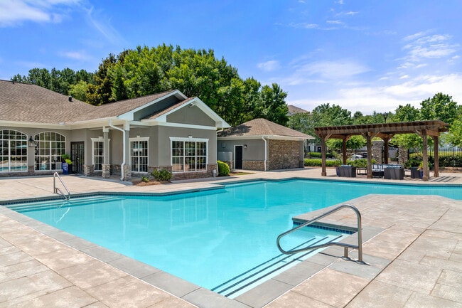 Soak up the sunshine by the sparkling pool.