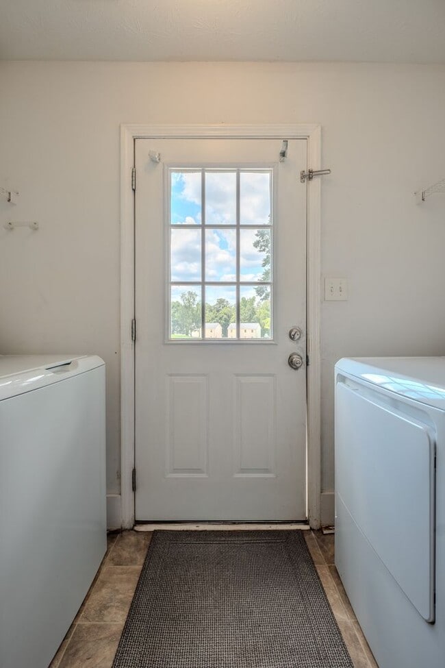 Photo - Spacious 4BR/3BA Townhome | Pet Friendly | Washer & Dryer Included | $1,600/mo