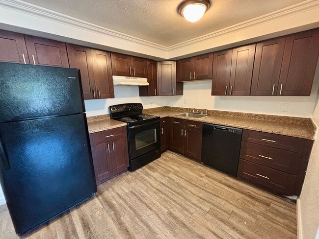 Building Photo - 7300 W 10th Ave Unit 08
