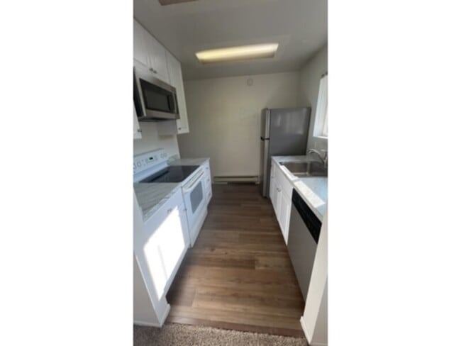 Photo - Tired of outdated rentals? This stunning two bedroom upper level duplex unit boasts a complete moder