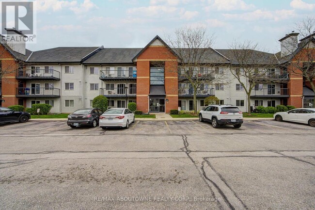 Photo - 1450 Glen Abbey Gate Unit 214