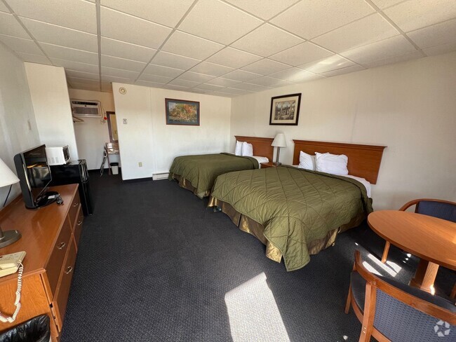 Building Photo - Corn Palace Inn Unit 2 bed, 1 bath suite Rental