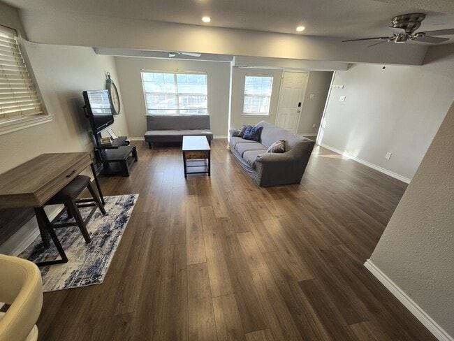 Spacious living room with desk