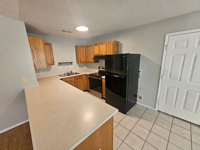 Photo - Nice 3 bedroom 2 bath home with fenced in ...
