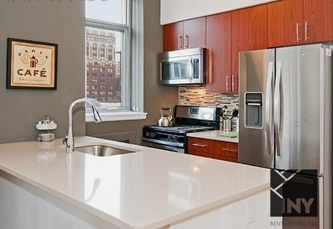Photo - 124 W 21st St Unit 2502