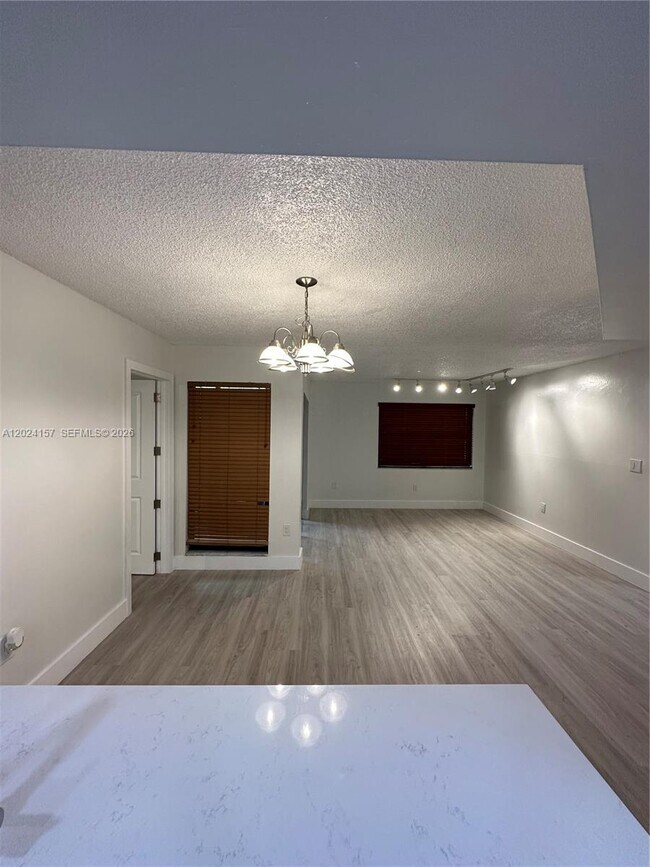 Building Photo - 10813 NW 7th St Unit 5-11