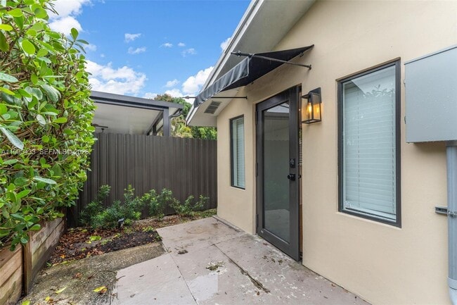 Building Photo - 5790 SW 5th St Unit REAR