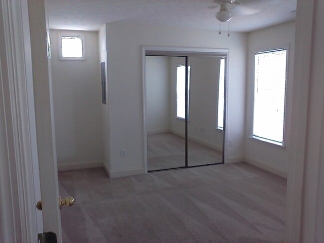 Primary Bedroom - Christopher Downs Apartments