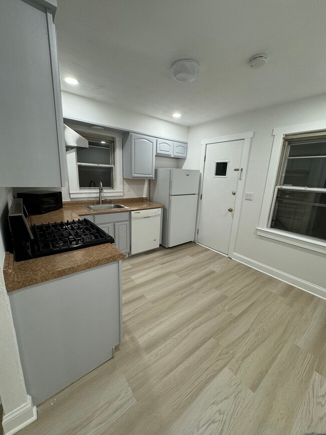 Kitchen layout before new appliances/counter - 77 Hibiscus St Unit 2