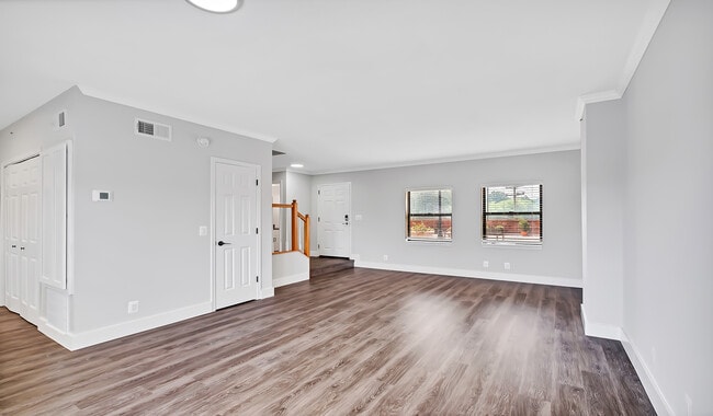 Select homes have upgraded kitchens/baths with wood flooring throughout