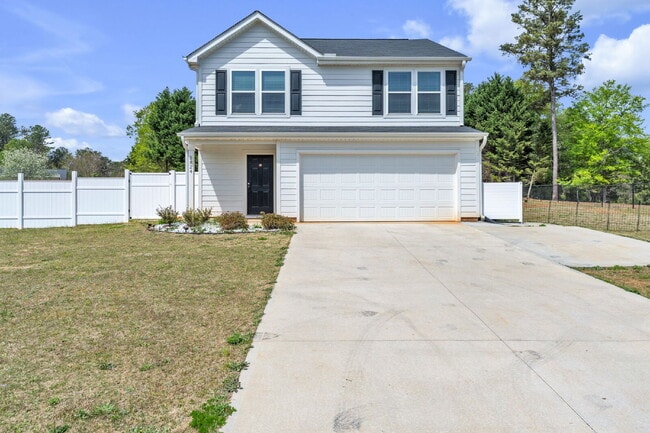 Building Photo - Stunning 3BR/2.5BA Home | Private Fenced Yard & Outdoor Oasis $2190/mo rent