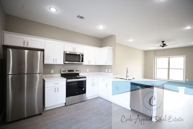 Photo - Luxury 2 bed 2 bath apartment - brand new construction!! Washer, dryer, internet, cable and utili...