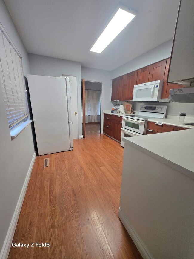 Photo - 10995-10964 64 Ave