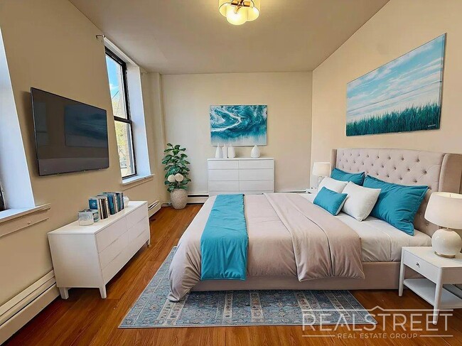 Photo - Bright & Renovated 2-Bedroom Apartment with Modern Amenities and Roof Access Unidad 2