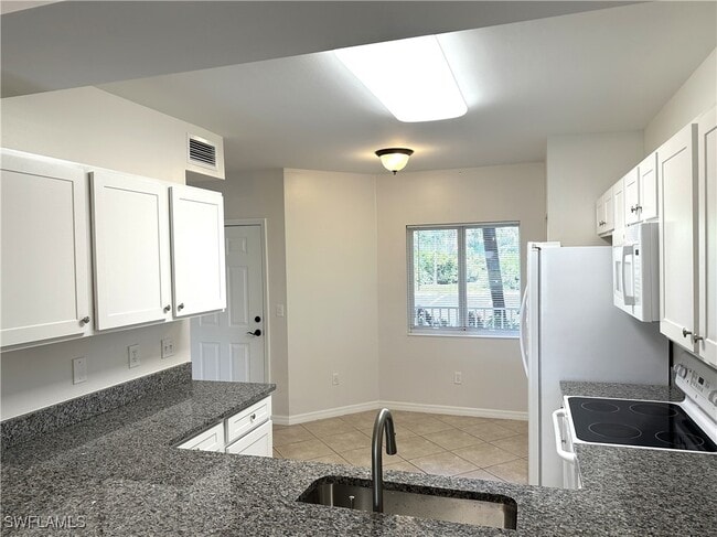 Building Photo - 10030 Maddox Ln Unit 102