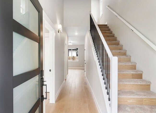 Photo - Brand-New 4-Bedroom Home Offering Modern Design, High-End Finishes, Attached Garage & Private Bac... Unit #A