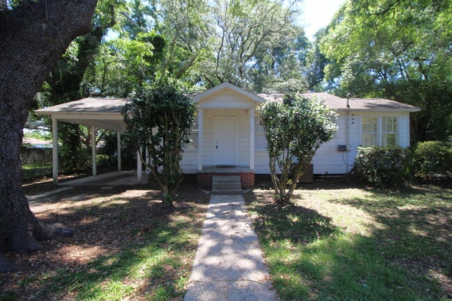 Building Photo - 2BR Cottage Home with LVP Flooring Throughout, Bonus Sunroom, Covered Parking & Low-Maintenance L...