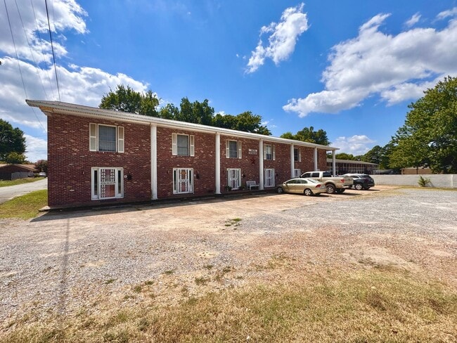 Building Photo - 2/1.5 1400sqft Townhouse with Water, Trash... Unit Apartment 5