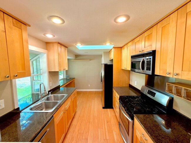 Photo - Spacious 4BD/3BA Bellevue Home with Private Backyard & Garage
