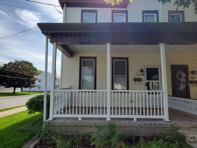 Photo - Pet friendly duplex w brand new kitchen & first floor LVP, basement, fenced yard, deck, near comm...