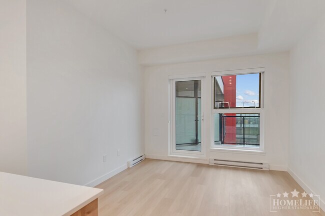 Photo - Modern 1 Bedroom + Den at The District at ... Unit 614
