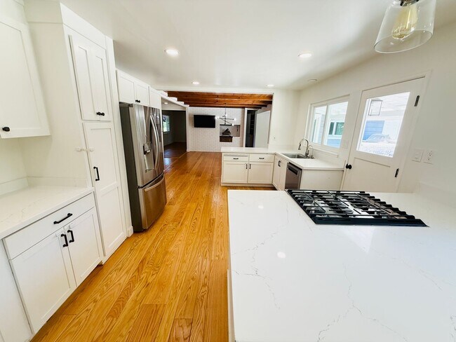Photo - Corner lot 4-bedroom, 3-bathroom, 2,100 sq. ft. ranch-style home.  Great Location!