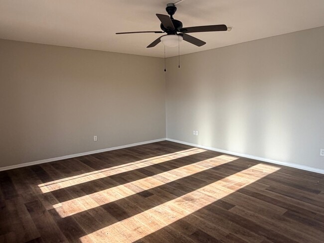 Photo - Upstairs 2/1 apartment with fresh paint and  updated flooring.