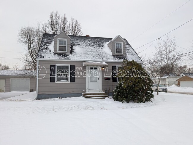 Building Photo - Well-Maintained Cape Cod with Garage on Corner Lot