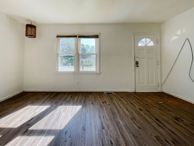 Photo - Fenced Yard and Garage
