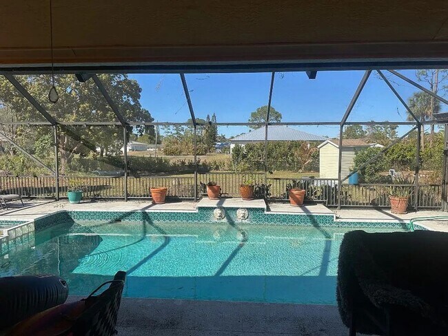 Photo - Beautifully Renovated Pool Home in The Acreage - 3bed | 2.5bath