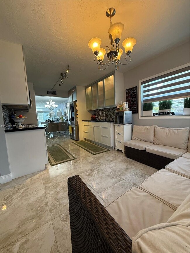 Building Photo - 12950 SW 4th Ct Unit 112H